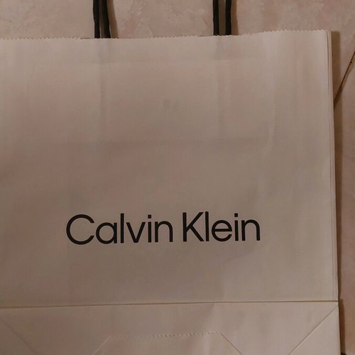 Calvin Klein small paper bag like new, black and white