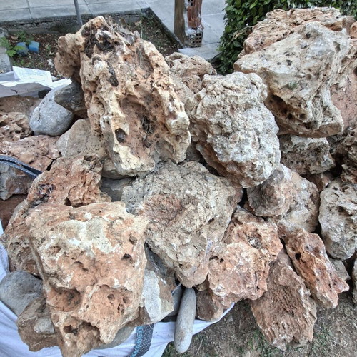 Decorative stones with holes used for waterfalls and rock gardens