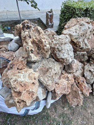 Decorative stones with holes used for waterfalls and rock gardens