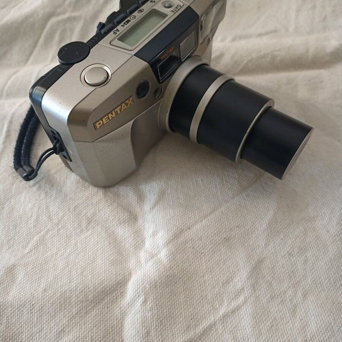 Pentax Espio 140 used camera with faint LCD indicators