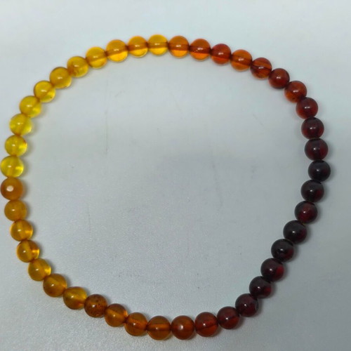Handmade bracelet from natural amber with color gradient like new