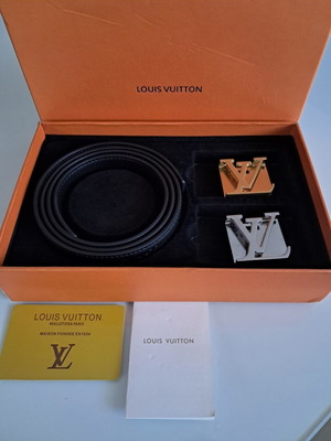 Louis Vuitton leather belt with interchangeable buckles