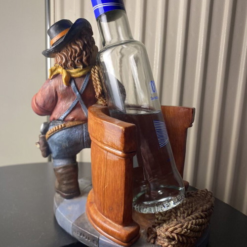 Resin figurine like new, bottle holder
