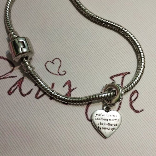 Silver plated bracelet with heart charm new, length 18.5 cm