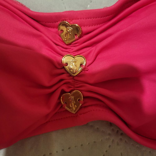 Juicy Couture bikini top like new, fuchsia color, adjustable tie