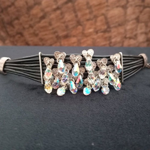 Leather women's bracelet with decorative hearts and rhinestones like new