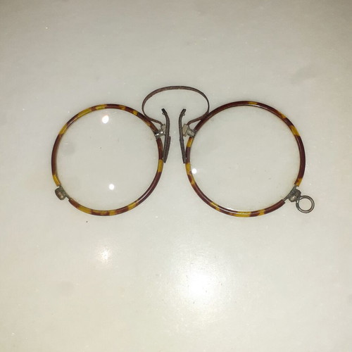 Presbyopia glasses antiques from 1920 used, brown and yellow