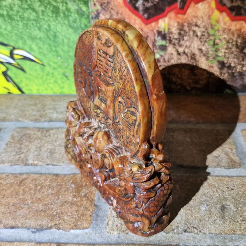 Stone carved sculpture used with dragons and coin
