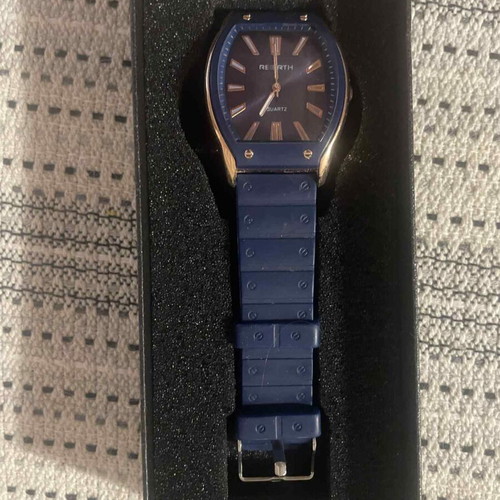 Unisex wristwatch with blue strap and gold details, like new