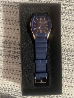 Unisex wristwatch with blue strap and gold details, like new