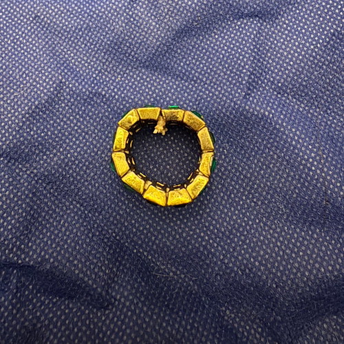 Adjustable gold ring with emerald stones like new