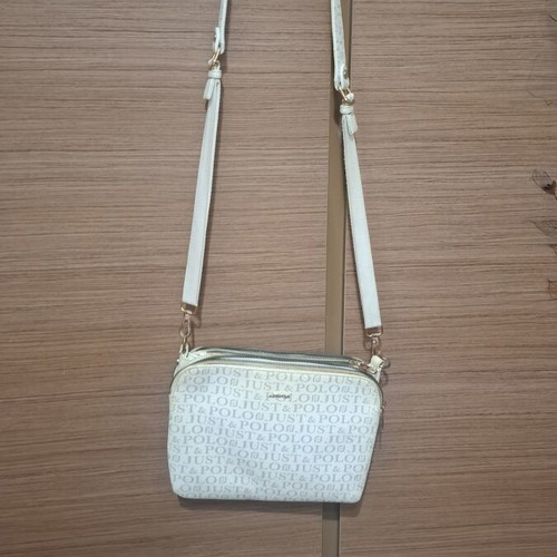 Crossbody bag used with compartments
