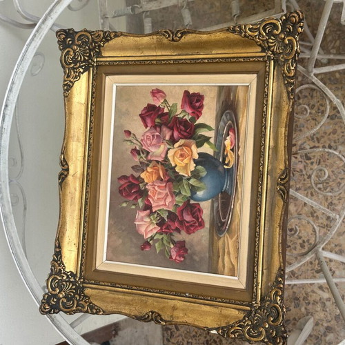 Vintage oil painting on canvas with roses in embossed gold wooden frame, used