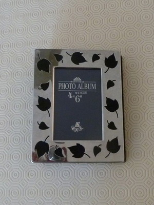 Retro photo album with silver cover and velour lining 10x15 cm like new