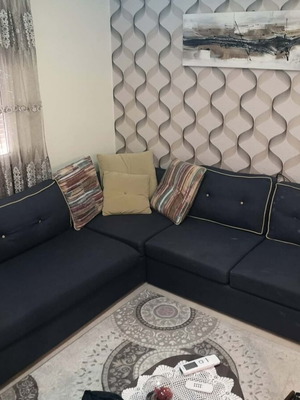 Corner sofa blue with pillows like new