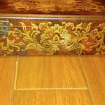 Wooden antique box used with embossed bronze decorations