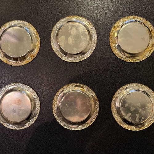 Silver-plated carved coasters like new