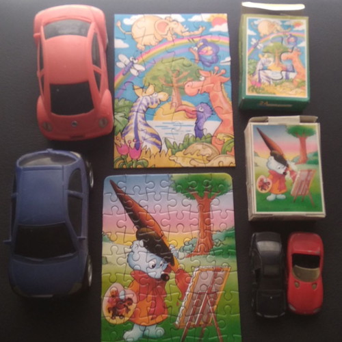Toy cars and puzzles used, set of 4 cars and 2 puzzles