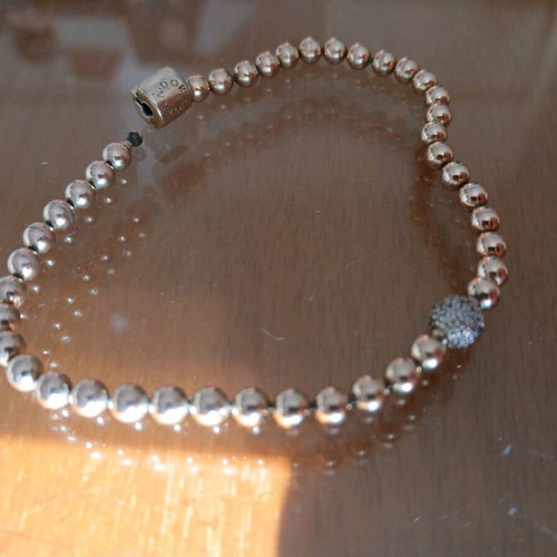 Pandora bracelet with 14K rose gold plating like new with zirconia