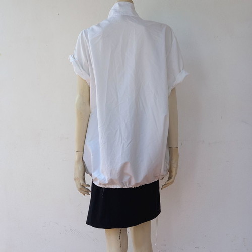 Oversize white shirt used with drawstring detail