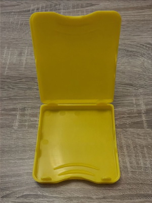 Vintage yellow plastic case for 3.5" floppy disks used