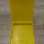 Vintage yellow plastic case for 3.5" floppy disks used