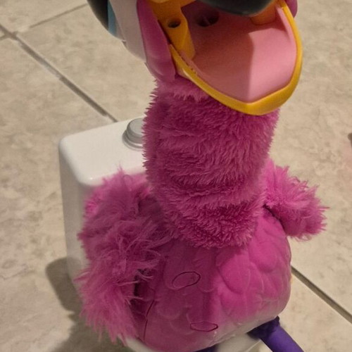 Flamingo Gotta Go interactive toy used, pink plush with electronic head