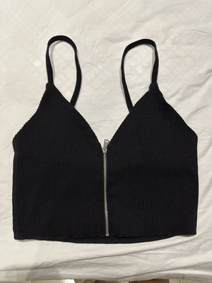 Black ribbed crop top with straps and front zipper