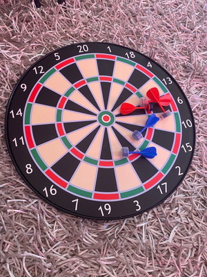 Dartboard with suction cup darts used