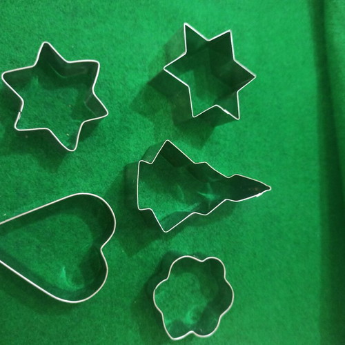 Cookie cutters with Christmas designs used