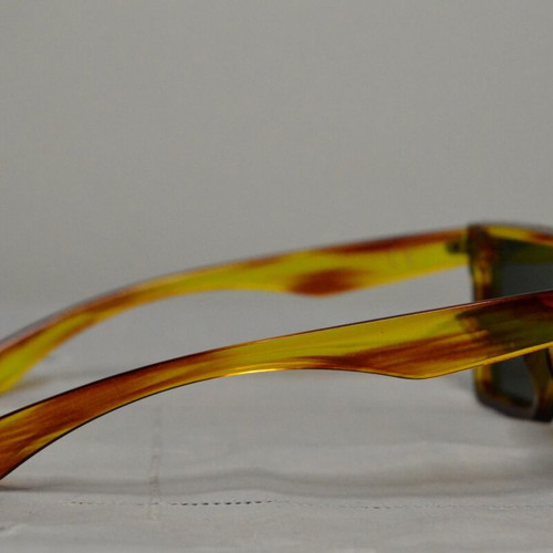 Square sunglasses used yellow and green