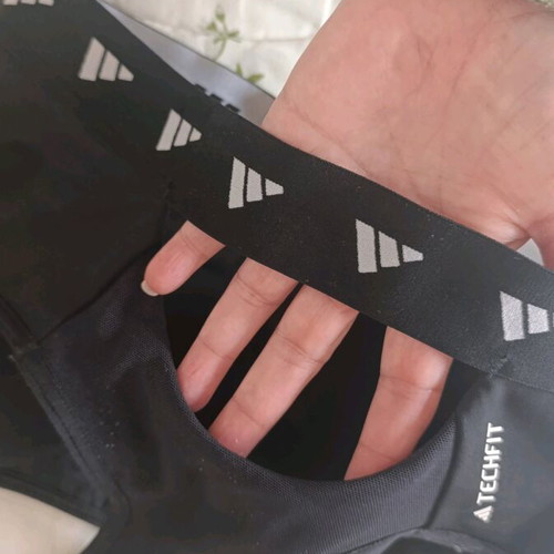 Adidas sports bra like new, black and white, size M/L