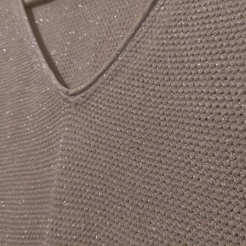Oltre knitted sleeveless silver top like new, size Medium