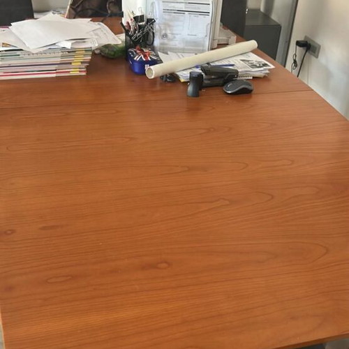 Solid wood dining table designed by Eleni Natsi