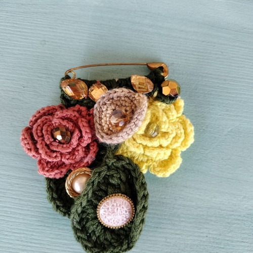 Handmade crocheted brooch