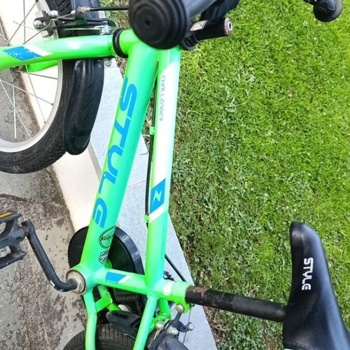 Style Challenger bicycle used, green with training wheels, ages 4-7