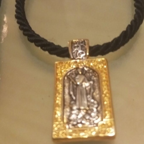 Religious pendant necklace like new, gold and silver