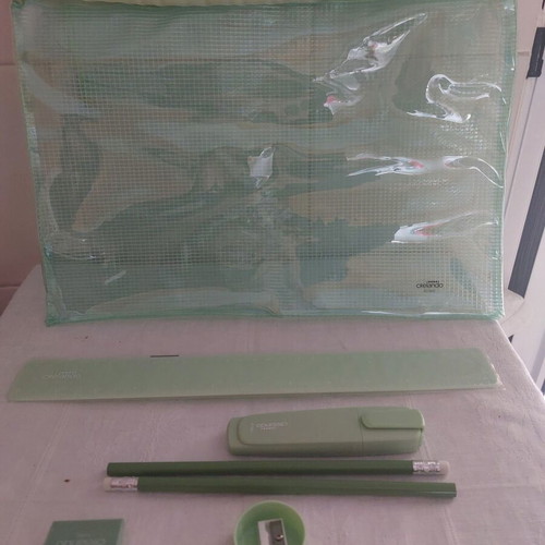Writing set 7 pieces new with plastic storage case