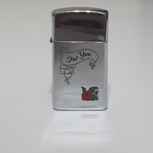 Zippo lighter used small size with engraved design