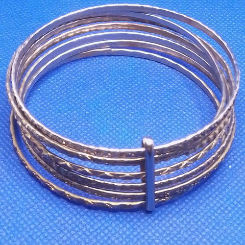 Metal bracelet with 7 rings used