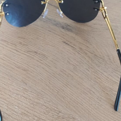 Women's sunglasses, black and gold, new with case