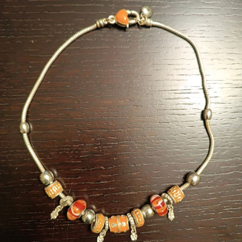 Necklace with charms like new, 45cm length, orange and silver
