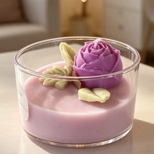 Handmade scented candle with rose in glass container, new