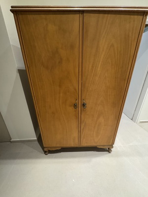 Wooden double-door wardrobe with internal drawers