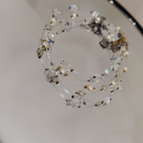 Handmade bracelet with crystals, pearls, and steel elements