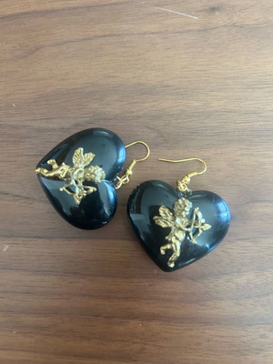 Vintage heart-shaped dangling earrings with embossed angels like new