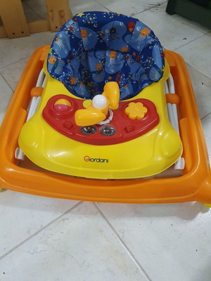 Baby walker like new with toys and comfortable seat