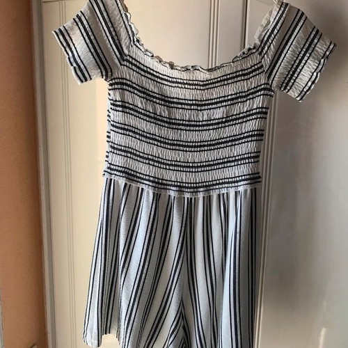 Set of two playsuits rompers like new, black floral and striped Bershka