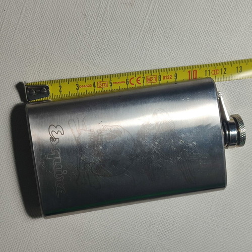 Metal flask used with laser graphics