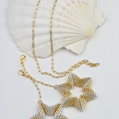 Necklace with two star pendants in white and gold custom made